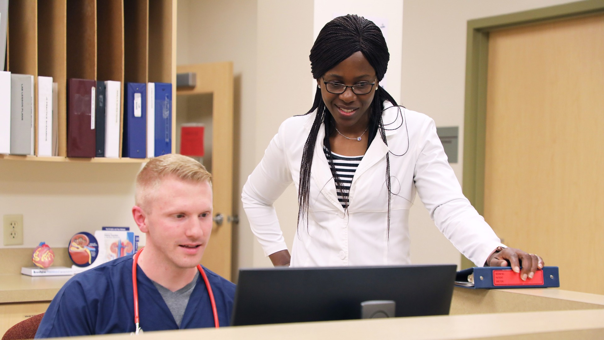 Two nursing professionals talking